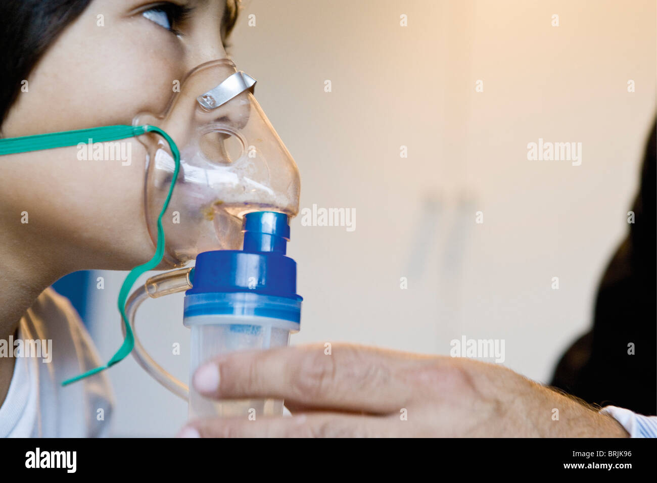 Boy receiving oxygen treatment Stock Photo