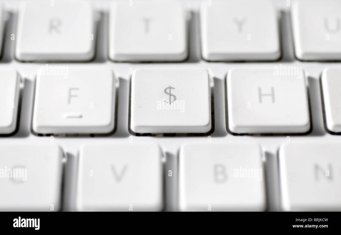 American dollar sign on laptop computer keyboard Stock Photo