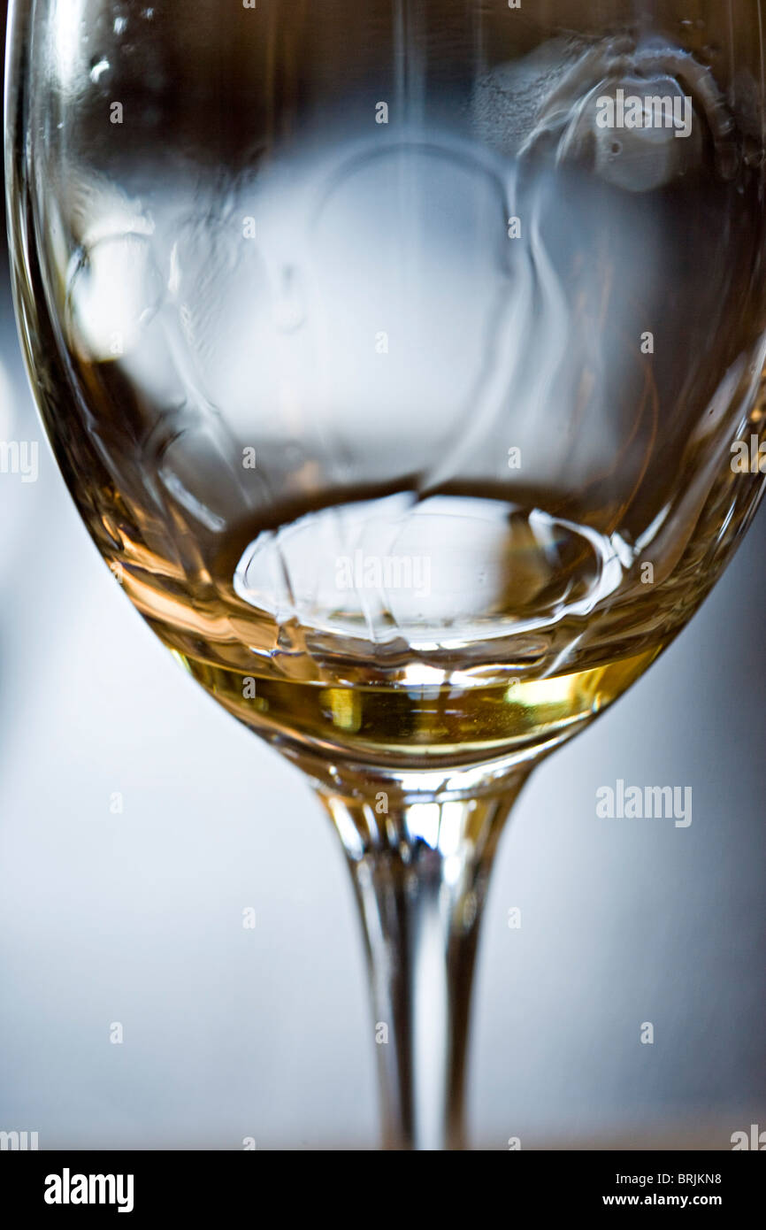 Tears of wine on glass of white wine Stock Photo Alamy