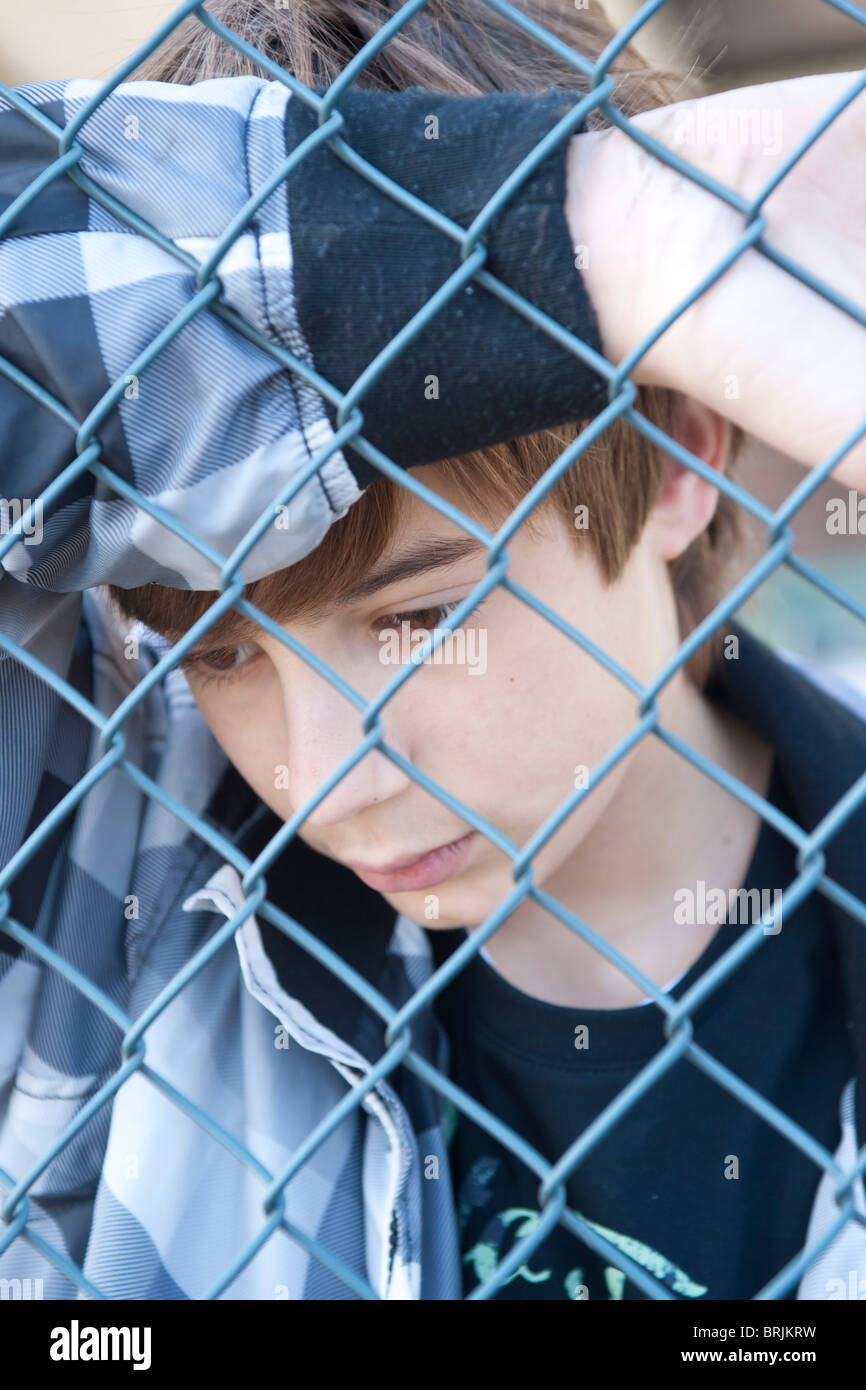 Close-Up of Sad Teenage Boy Stock Photo