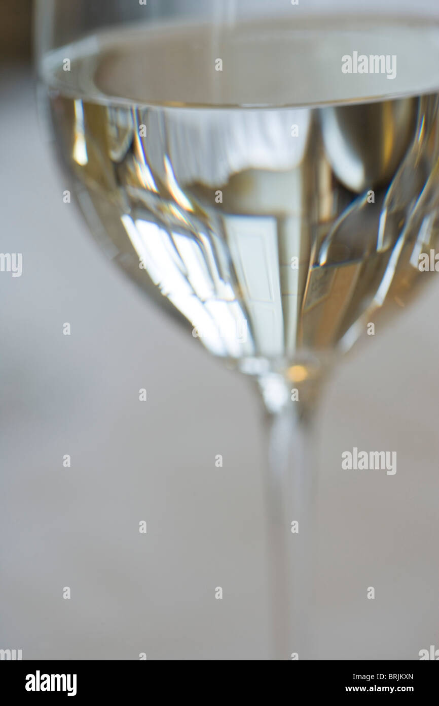 Reflection on glass of white wine Stock Photo