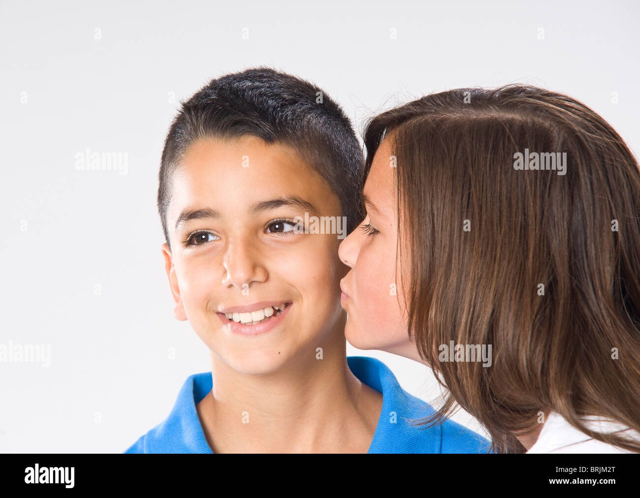 Girl and Boy Kissing Stock Photo
