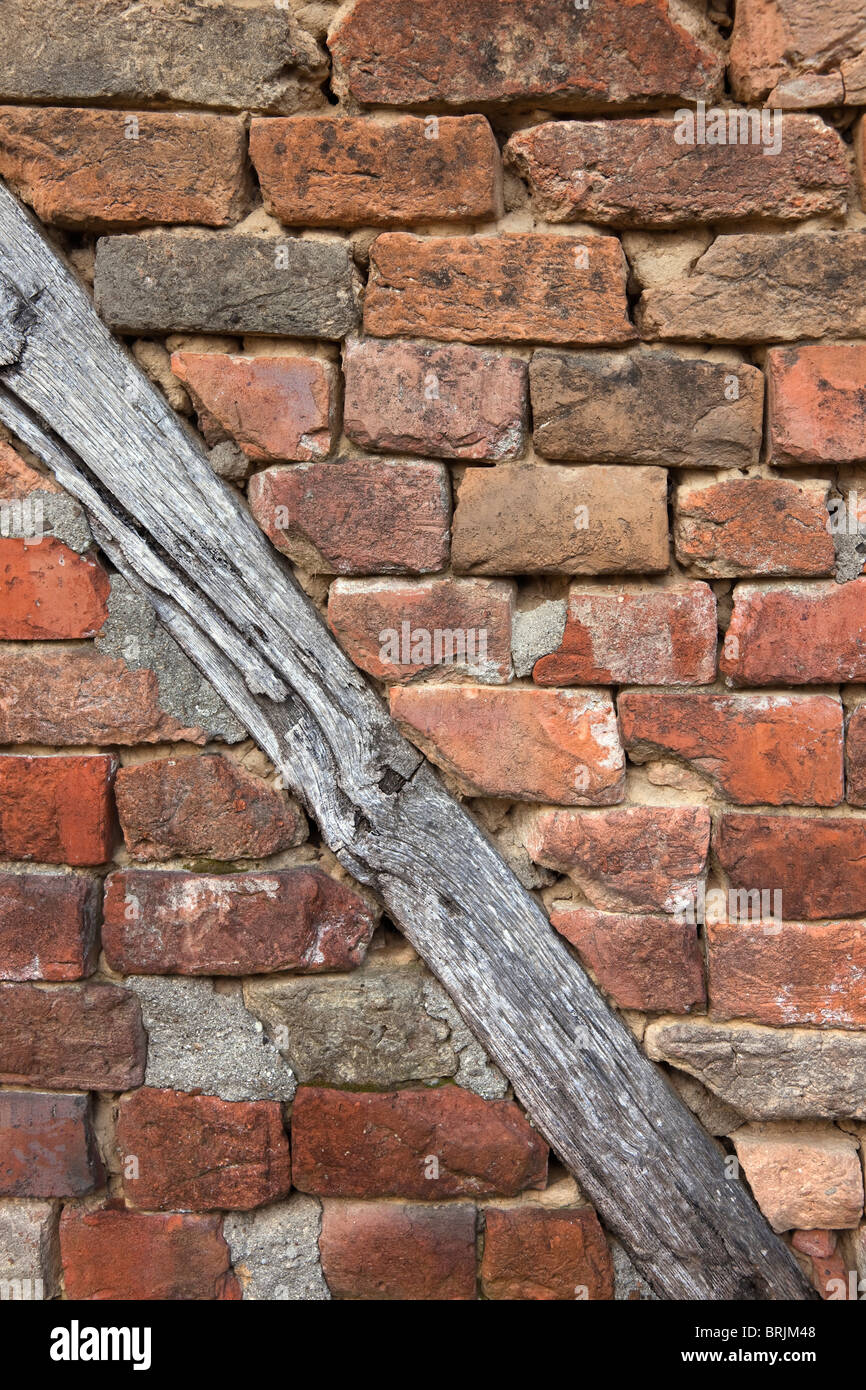 Detail of Wood Beam in Brick Wall, Jasenovac, Slavonia, Croatia Stock Photo
