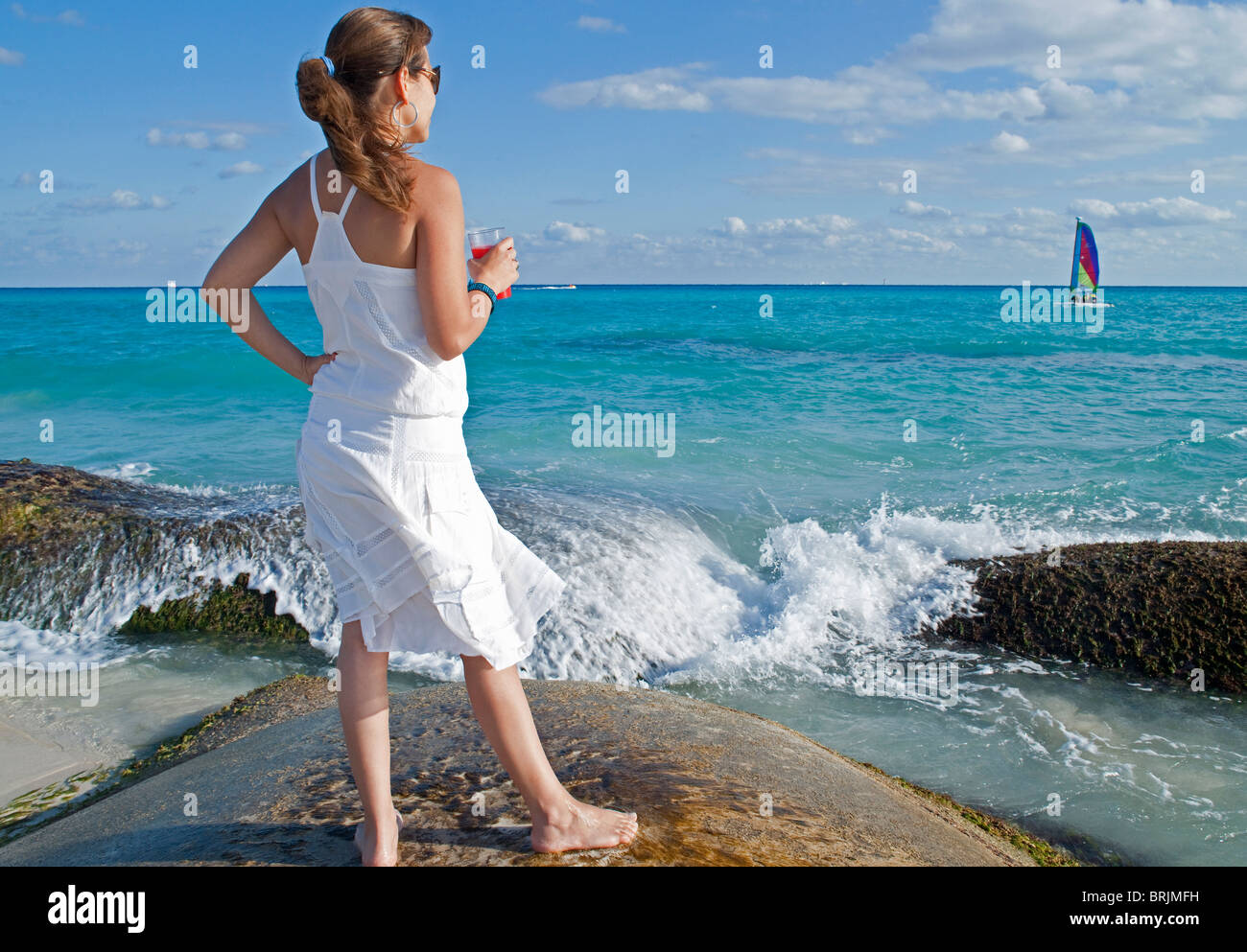 Woman on Beach Stock Photo - Alamy