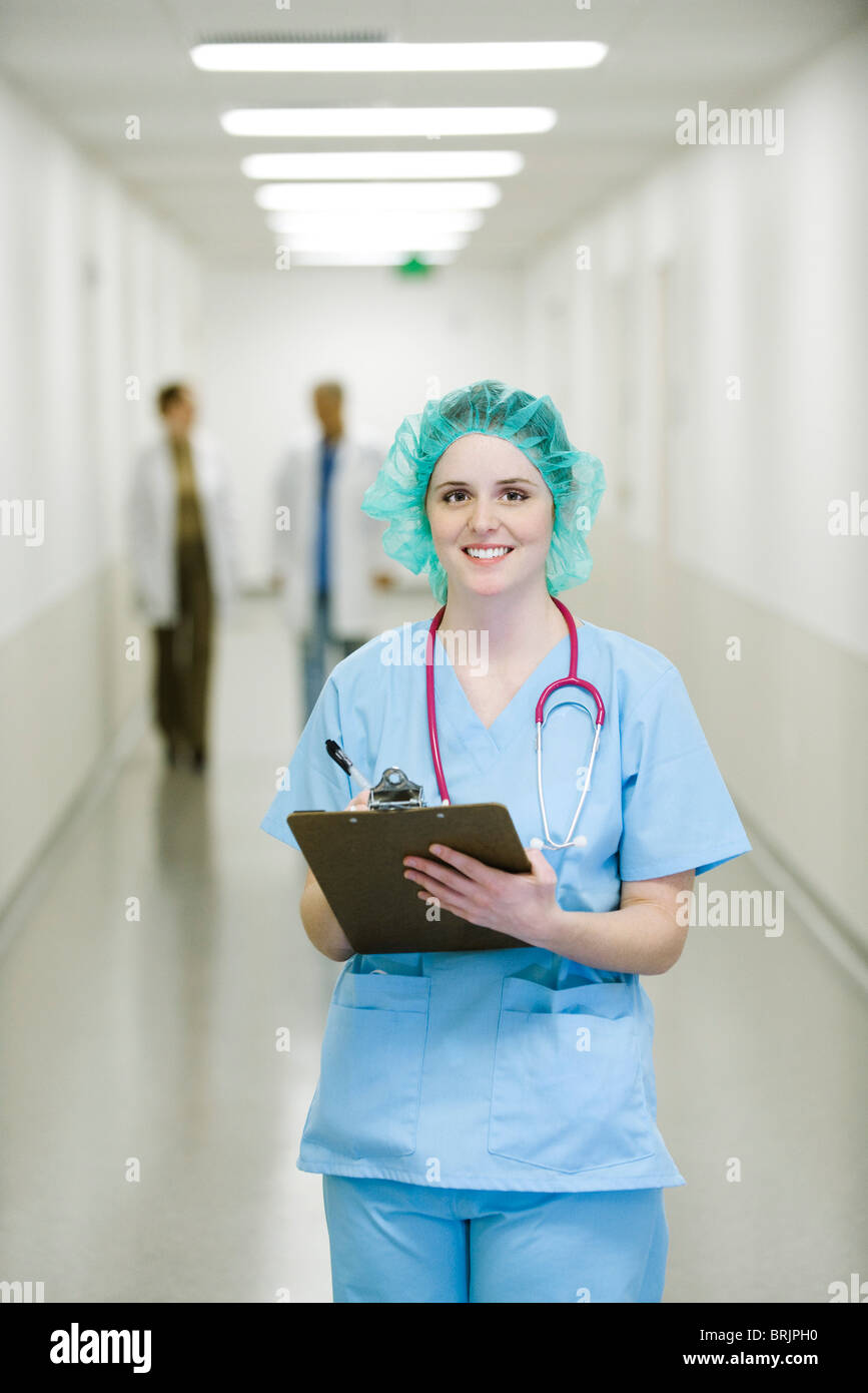 Nurse wearing surgical cap, portrait Stock Photo Alamy