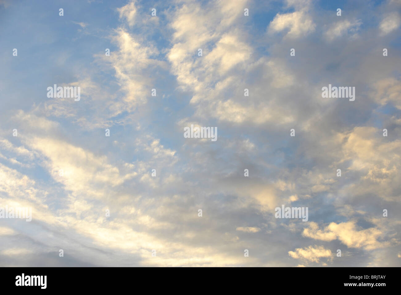 Summer evening sky of light cirrus clouds over the South Downs National Park, Hampshire, England Stock Photo