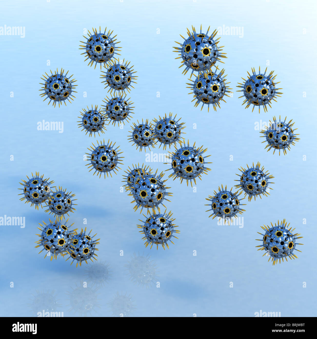 Metallic, shiny objects hovering over a blue, mildly reflecting surface, resembling viruses made from chrome with golden spikes. Stock Photo
