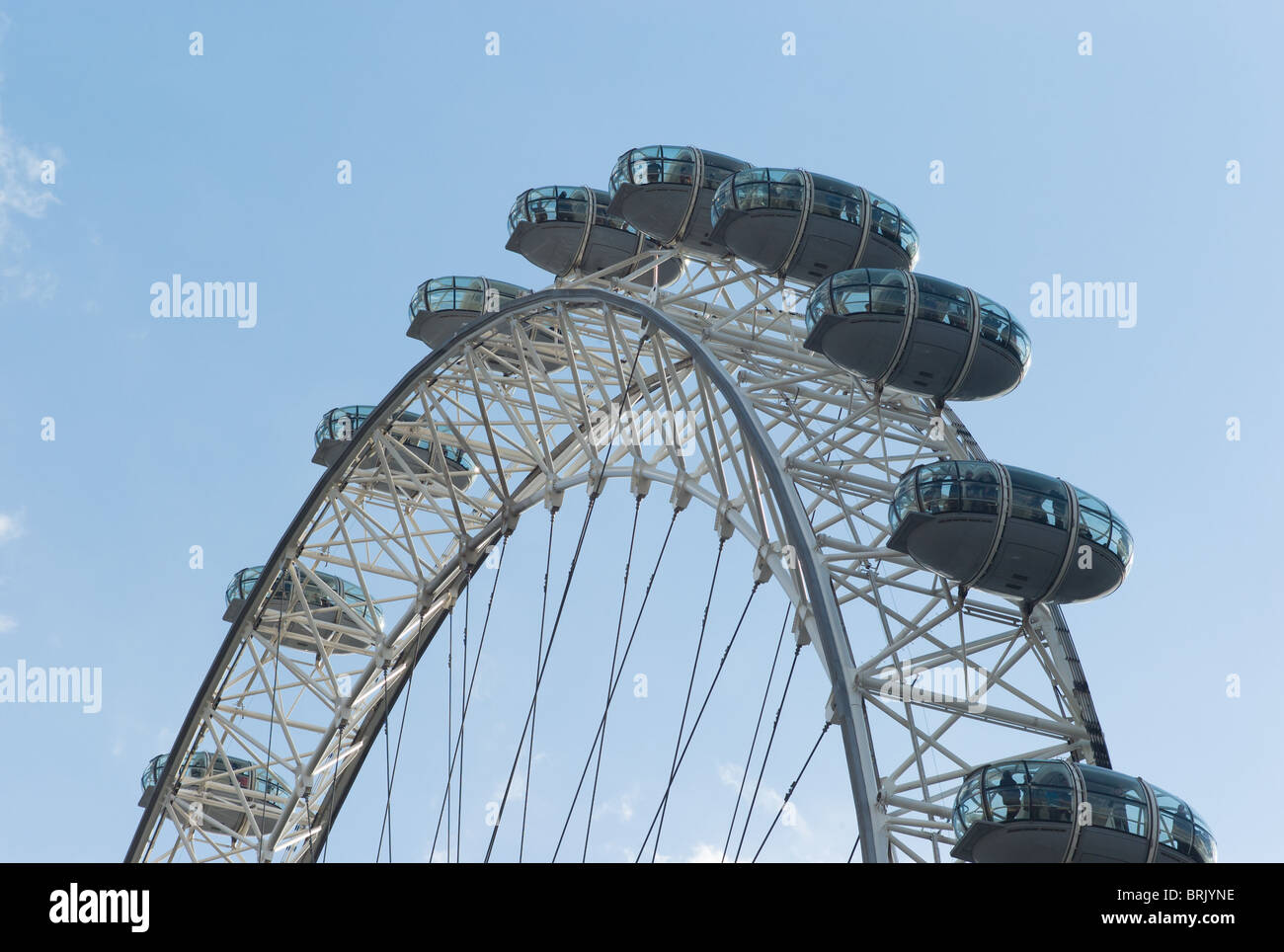 The London Eye against a blue sky in London, England Stock Photo