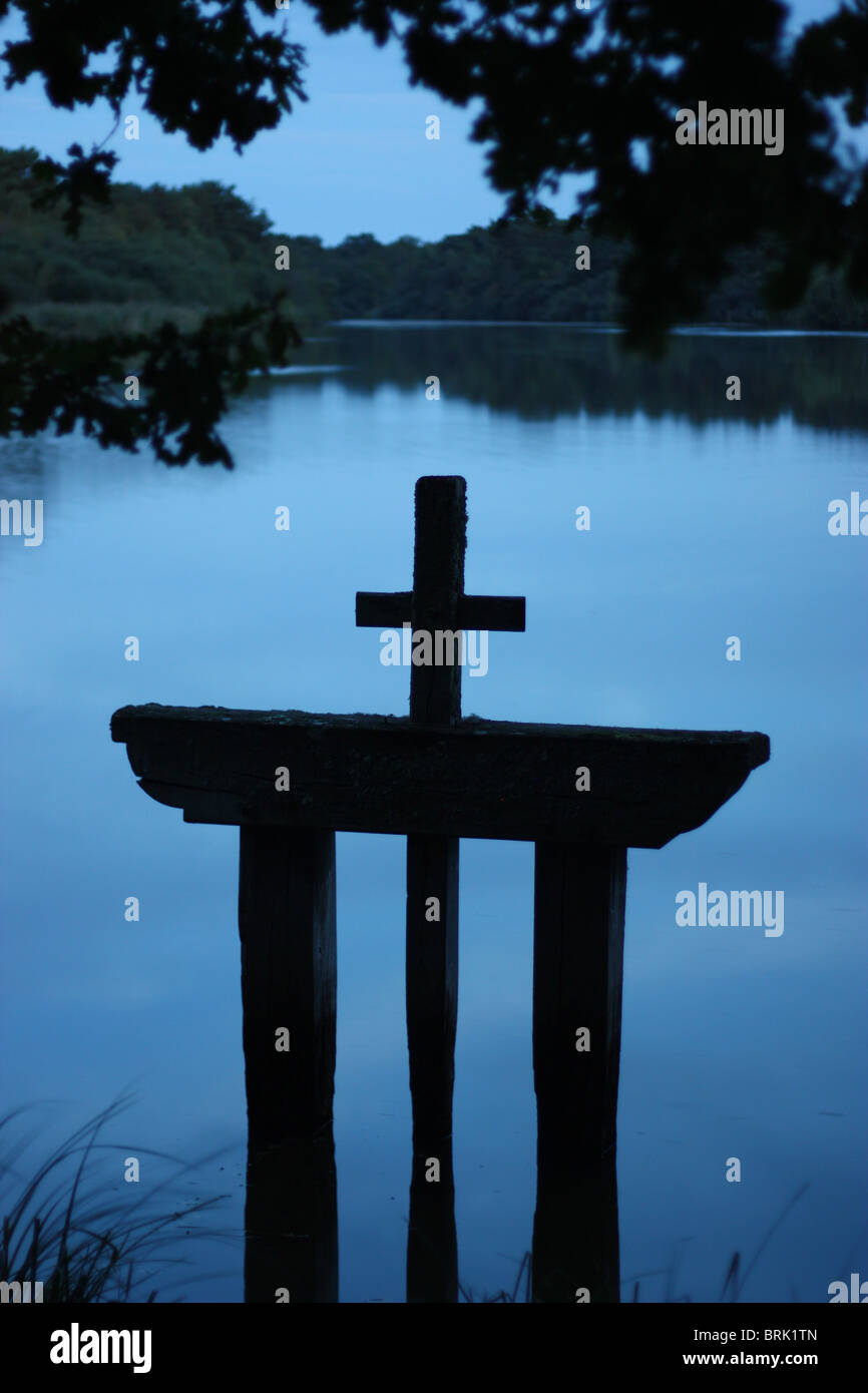 Wooden sluice gate on a pond in the woods, Loire Valley, France Stock Photo