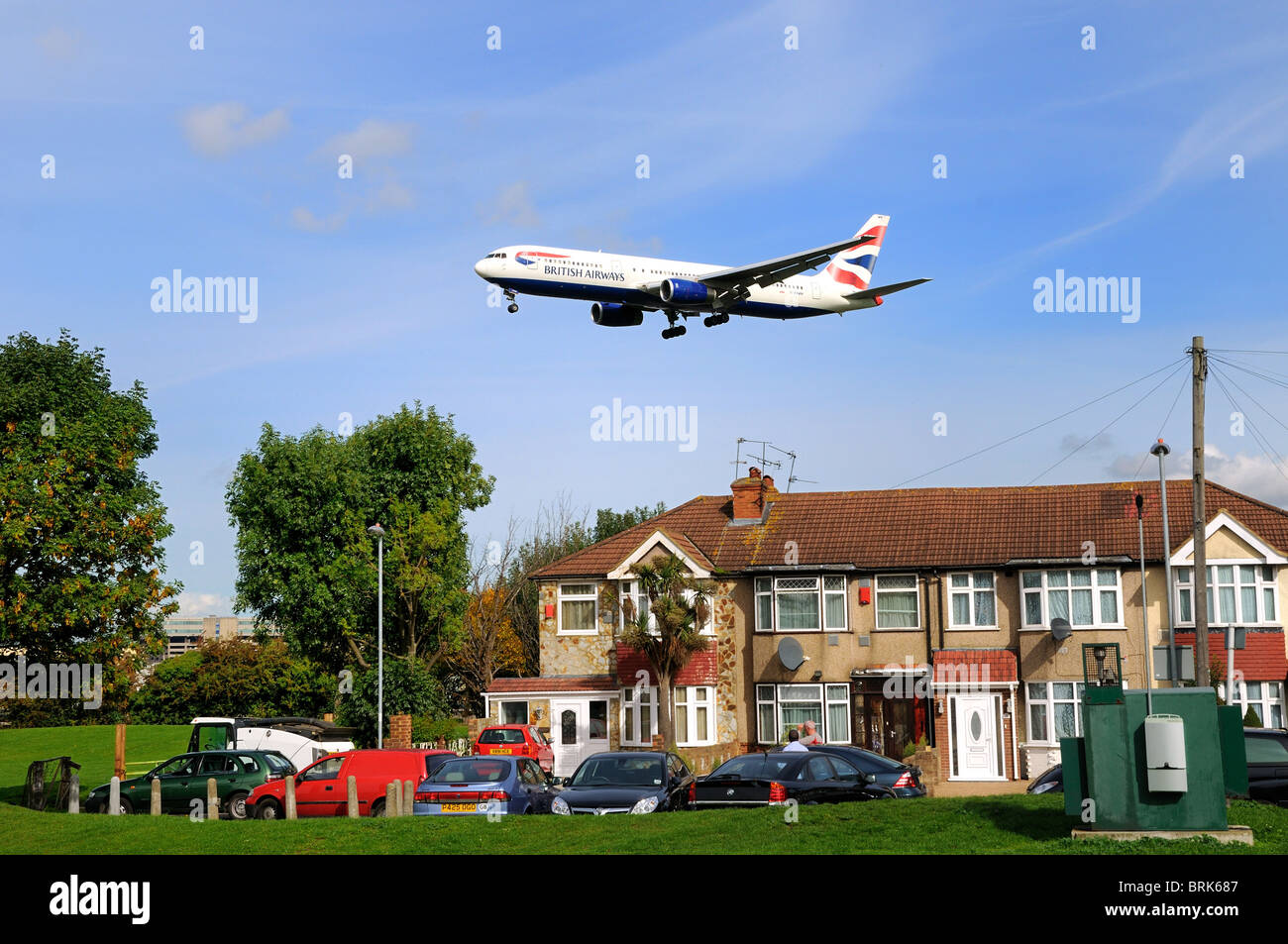 Low flying passenger  aircraft landing at Heathrow  airport, London Stock Photo
