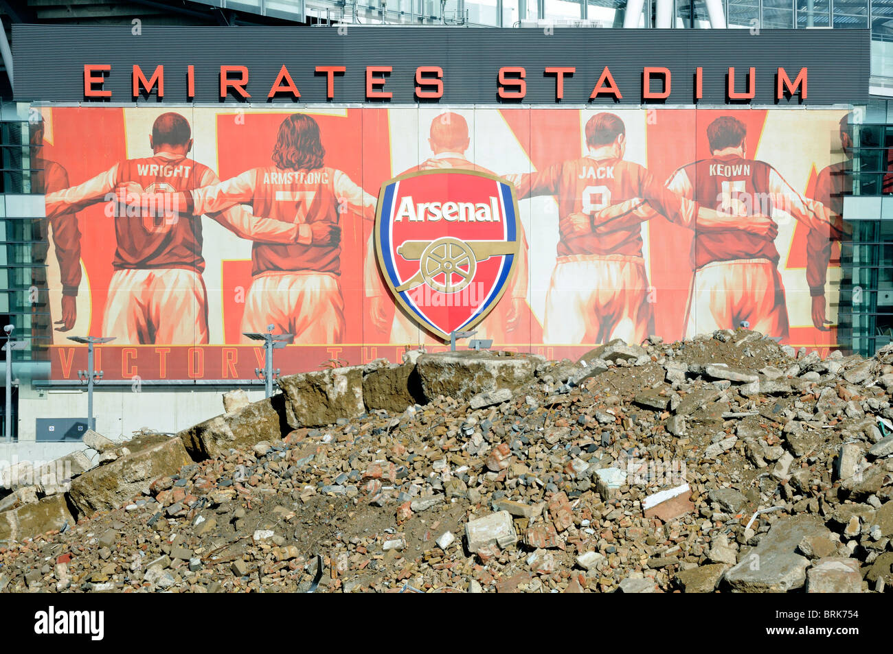 Emirates Stadium with rubble in front from the Queensland Road development, Holloway Islington London England UK Stock Photo