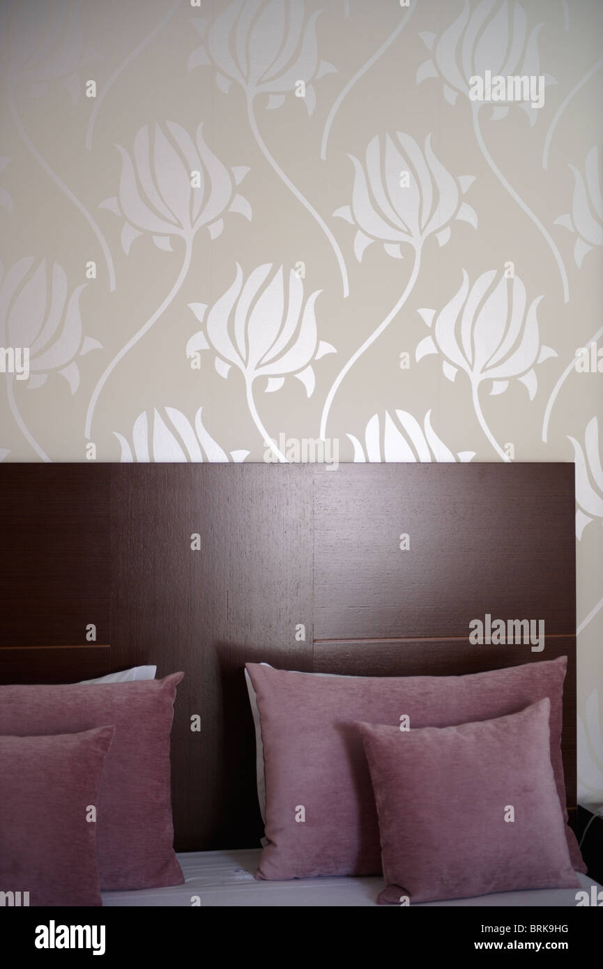 Hotel room with flower wallpaper Stock Photo