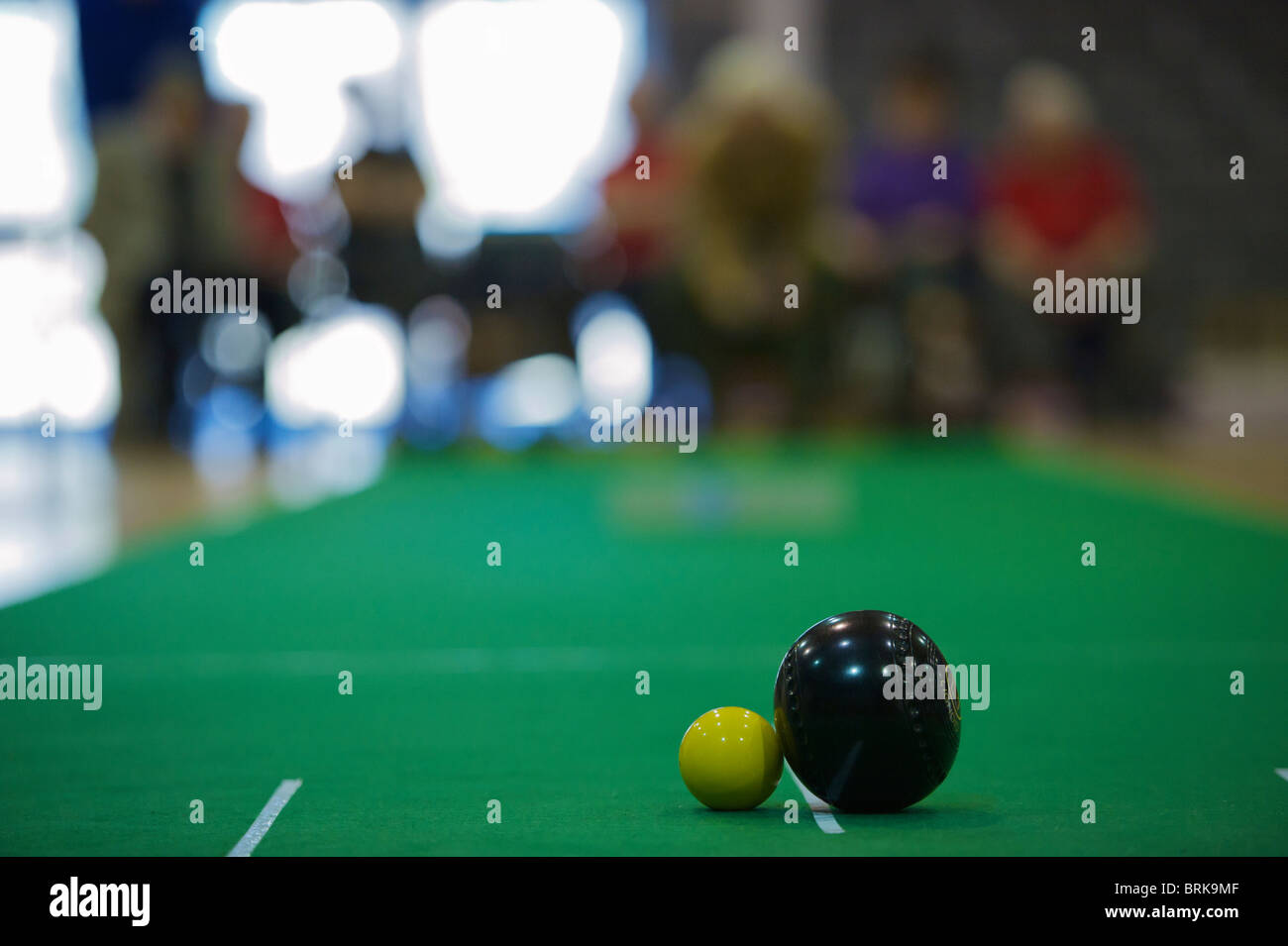 Bowls and the jack on a bowling green indoors Stock Photo Alamy
