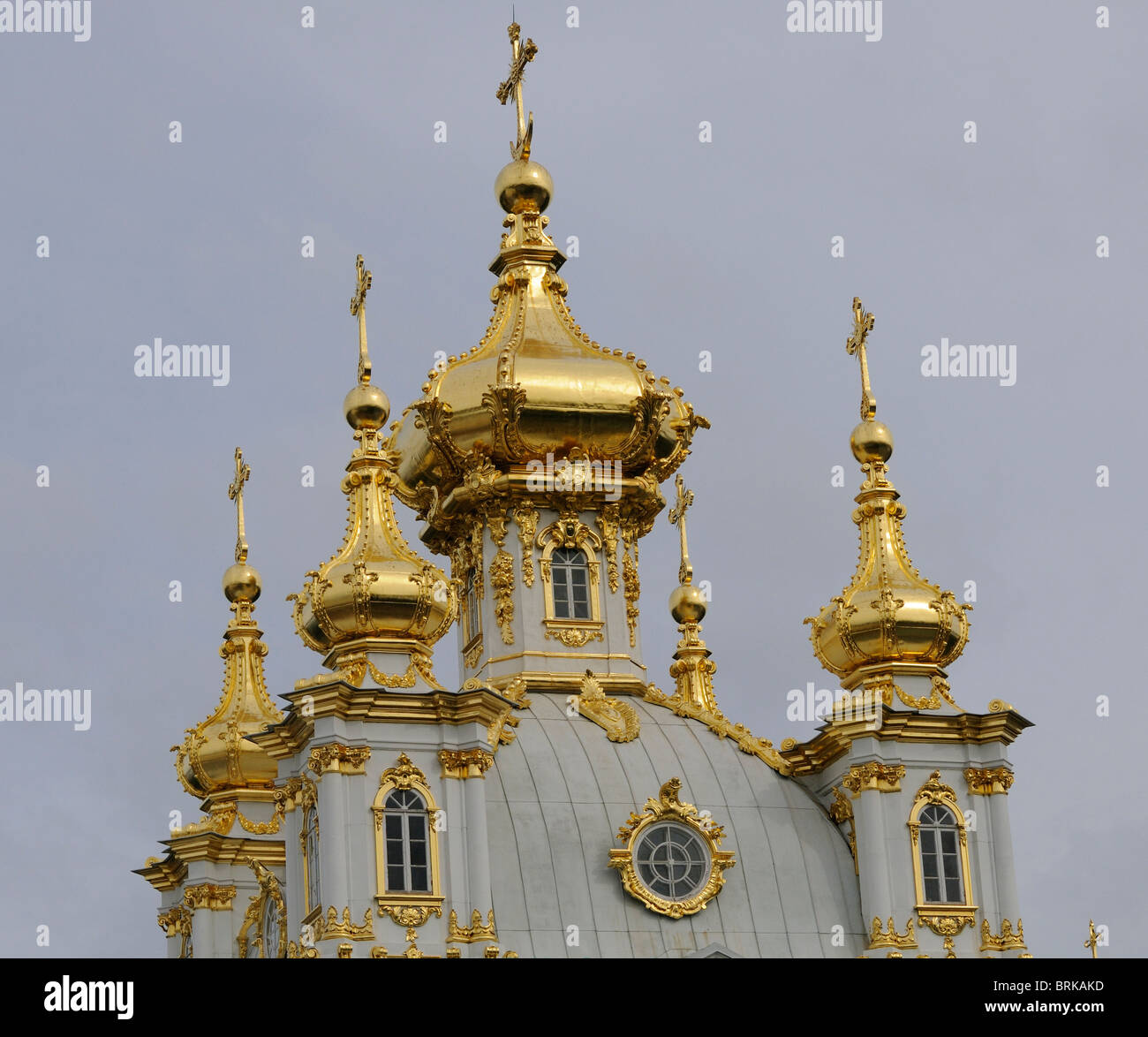 Golden domes and crosses on the roof of the chapel at  Peterhof. St Petersburg, Russia. Stock Photo