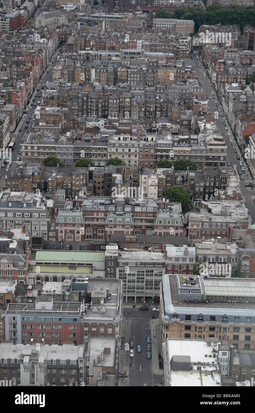 Aerial view (approx looking west) of packed buildings in central London