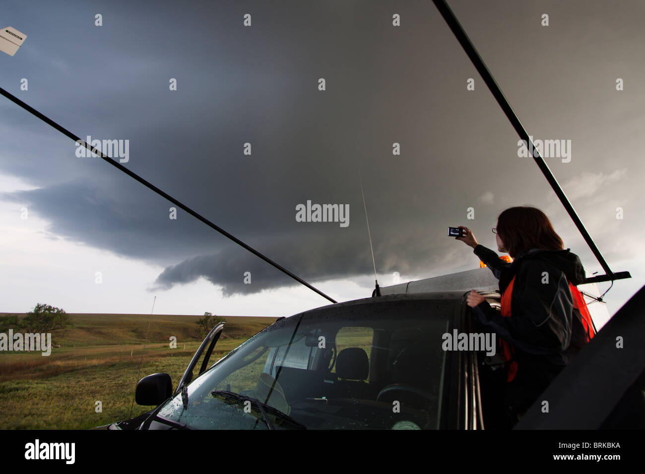 Project Vortex 2 storm chaser Lindsay Bennett watches a storm in Kansas, May 23, 2010. Stock Photo