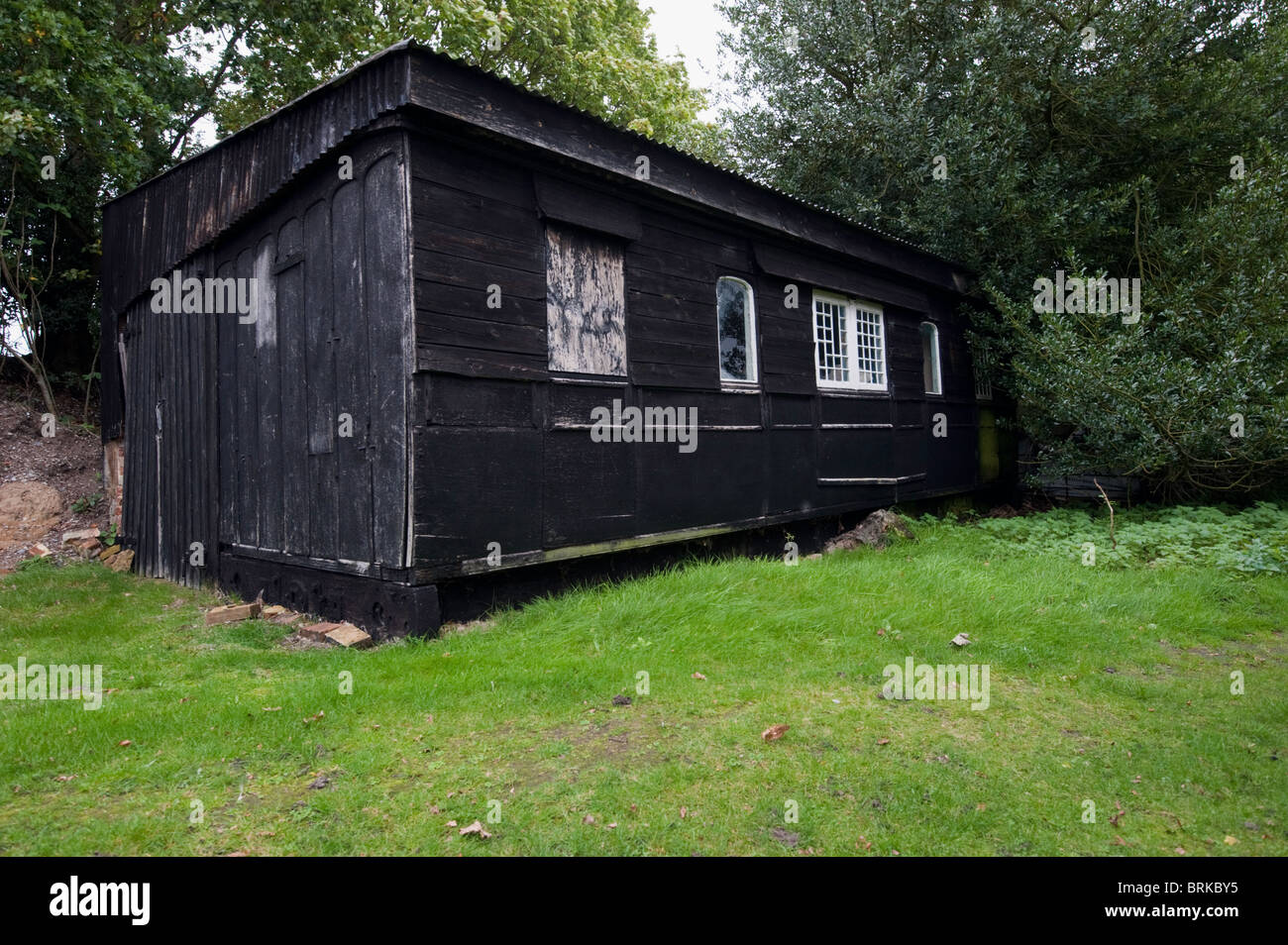 Old railway carriage conversion in the village of Westleton, Suffolk. Stock Photo