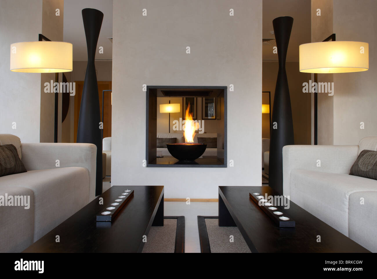 Living room with modern interior design and fireplace Stock Photo