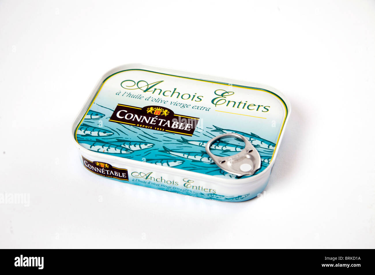 A sealed tin of Anchovies in olive oil with branding in French Stock Photo