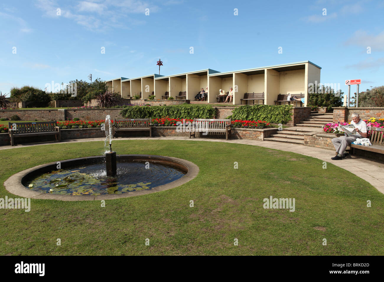 People enjoying the summer sun in Sheringham, Norfolk, UK Stock Photo ...