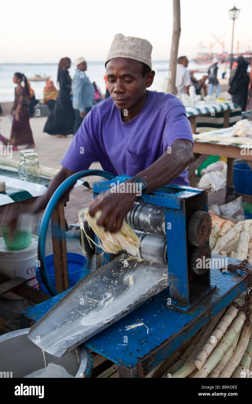 Forodhani Gardens, Stone Town, Zanzibar. Squeezing Sugar Cane to Make
