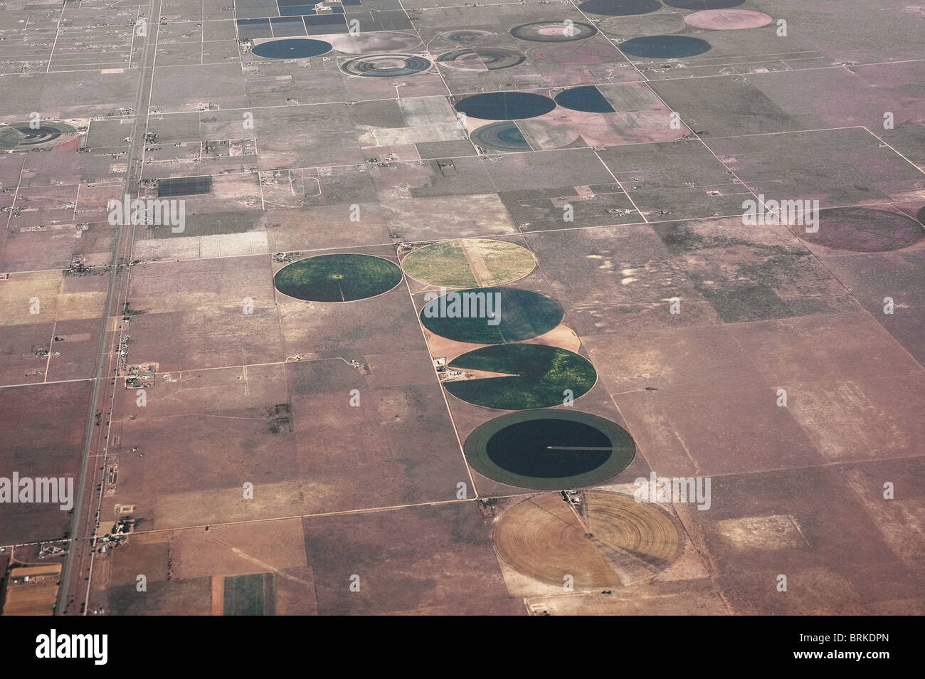 flying over Western U.S.A. crop fields. Stock Photo
