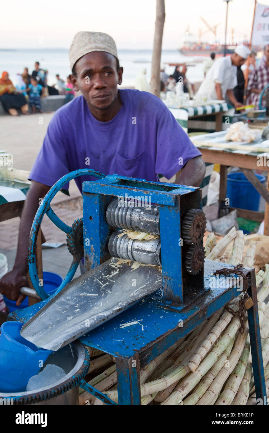 Forodhani Gardens, Stone Town, Zanzibar. Squeezing Sugar Cane to Make