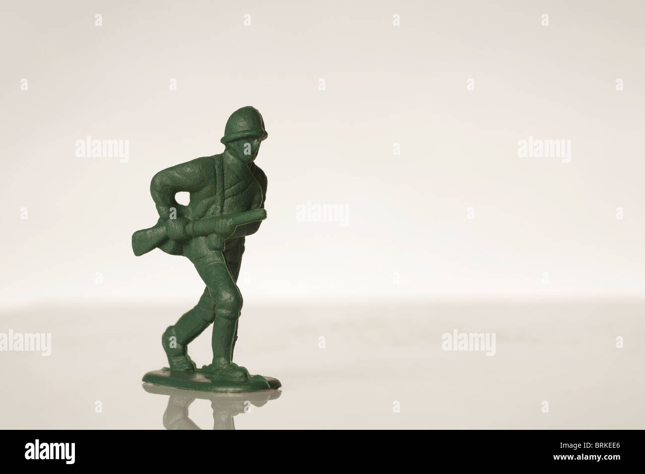 green toy soldier on white back ground Stock Photo - Alamy