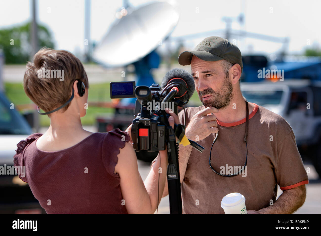 Reality TV show star and IMAX director Sean Casey is interviewed by a Discovery Channel camerawoman for the series 'Storm Chaser Stock Photo