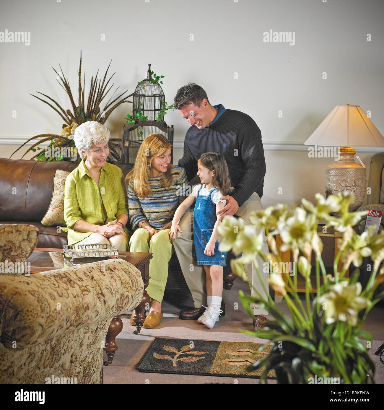 Multi generational family gather in living room Copy space Stock Photo ...