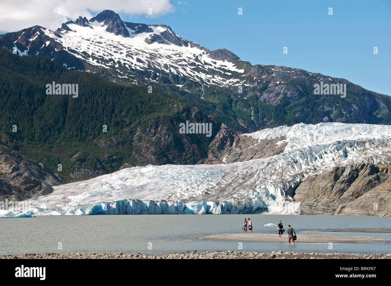 People paddling in glacial lake at Mendenhall Glacier near Juneau Alaska USA Stock Photo
