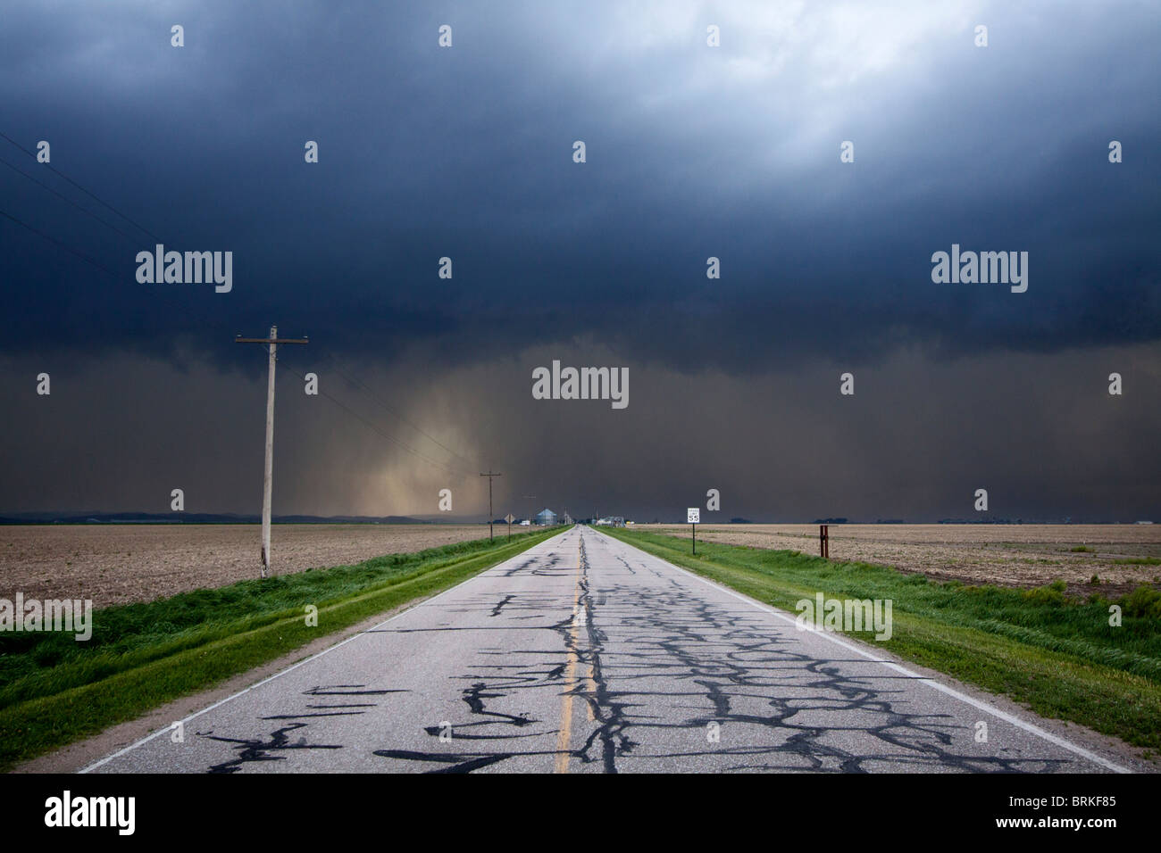 A rural Nebraska highway leads into a severe thunderstorm, May 24, 2010. Stock Photo