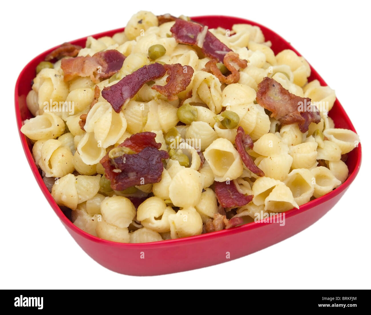 mini shell pasta with bacon and pea cream sauce Stock Photo Alamy