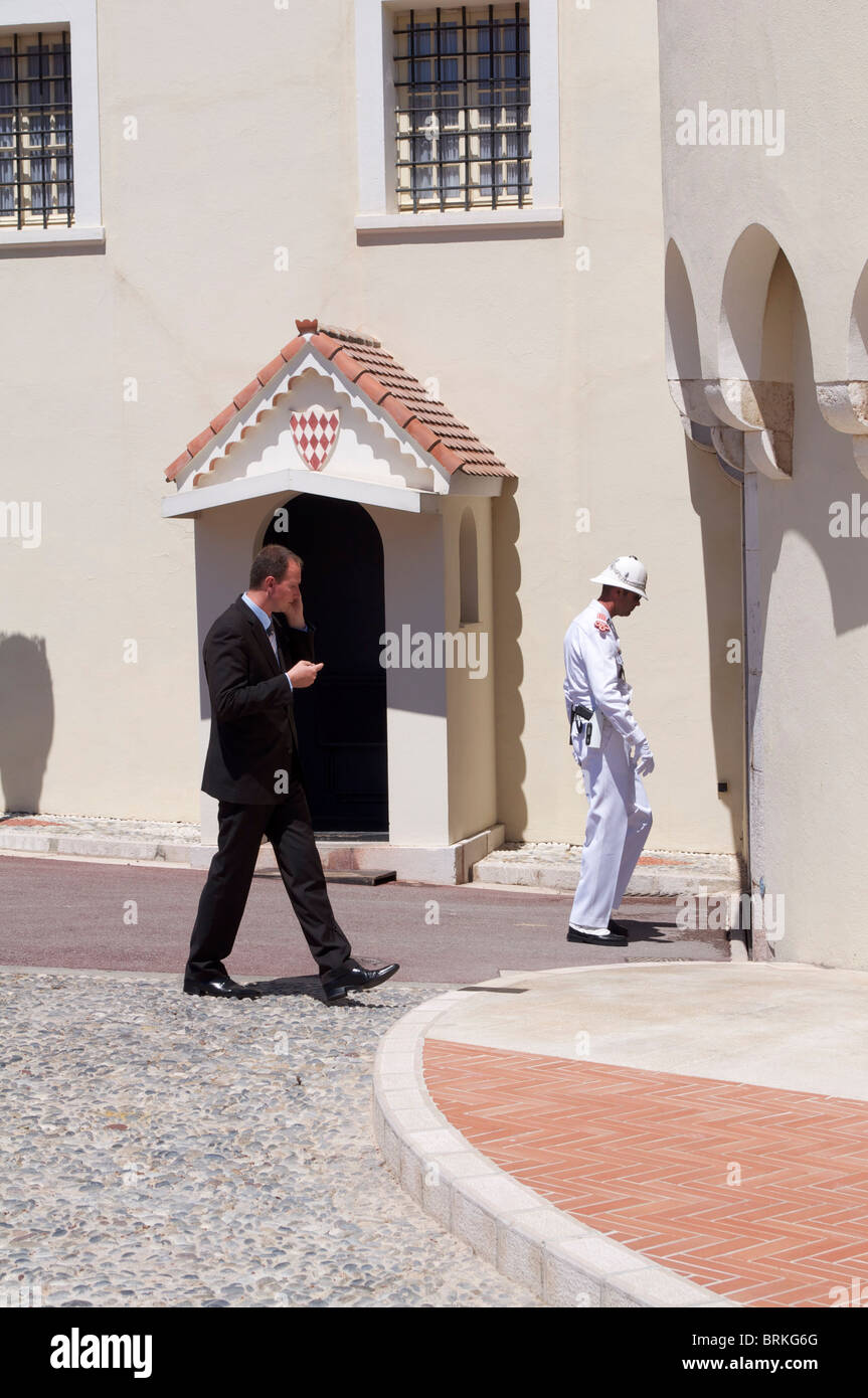 A guard and Tourist at the Grimaldi Palace in Monaco Stock Photo