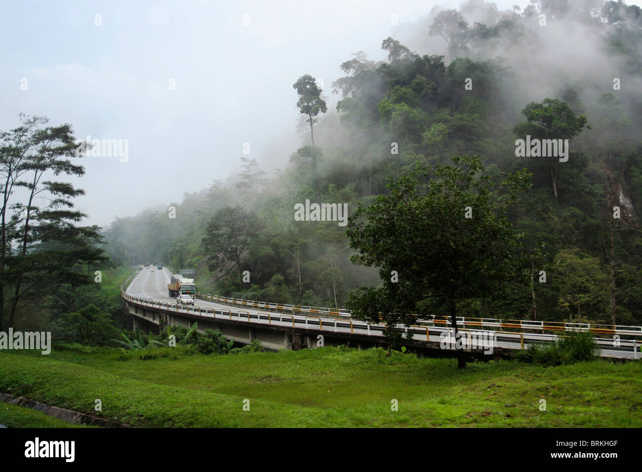 Karak Highway cutting through tropical rain forest in Malaysia Stock ...
