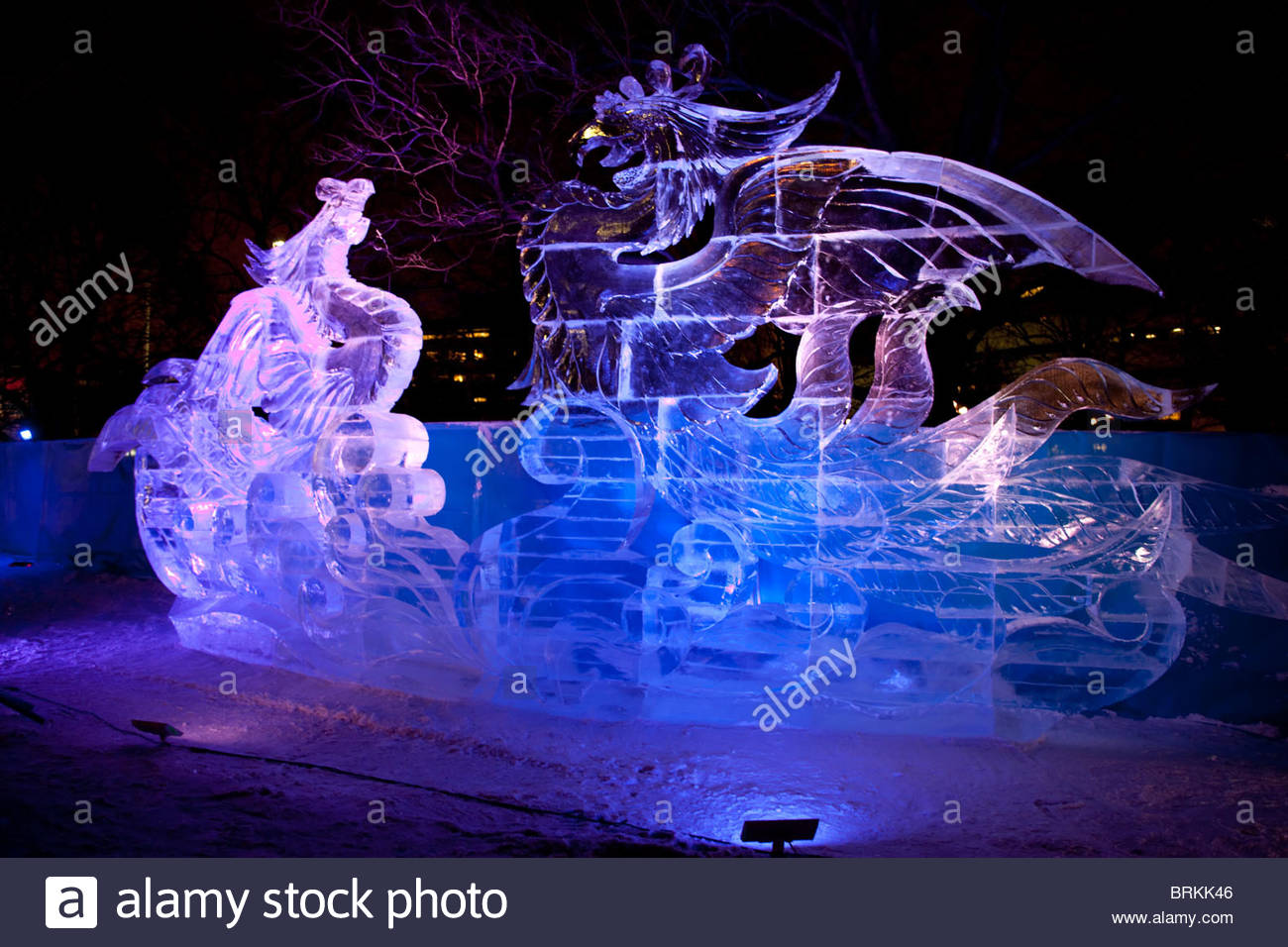 An ice sculpture created for the Winterlude festival is lit at night