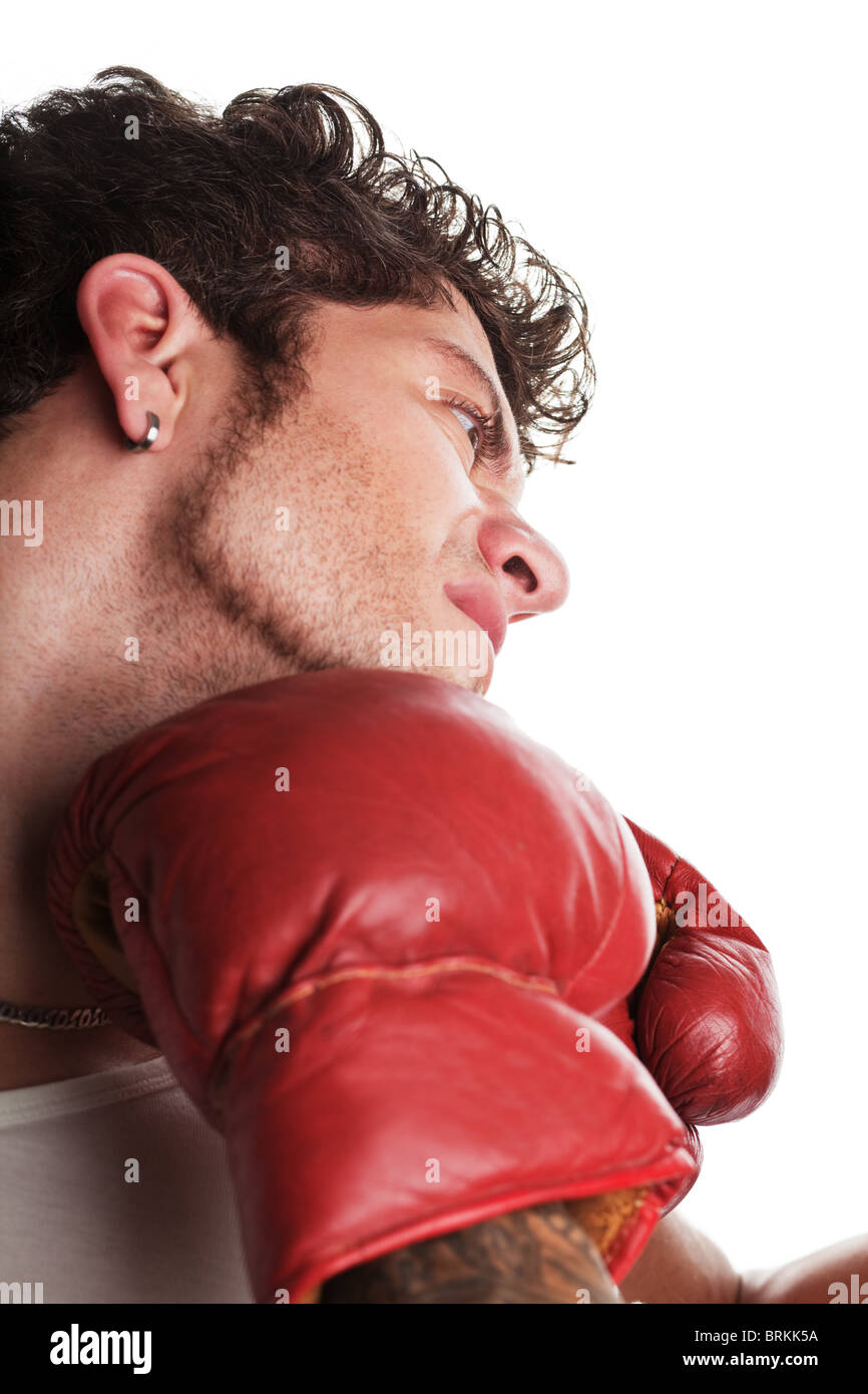 Young man hit in the jaw in boxing Stock Photo Alamy
