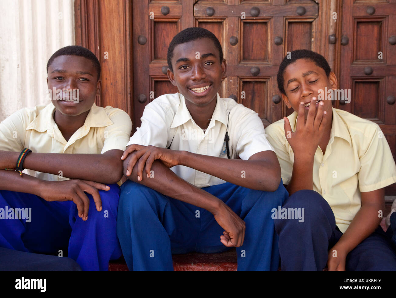 Zanzibar, Tanzania. Secondary School Teenage Boys in Stone Town. Stock Photo