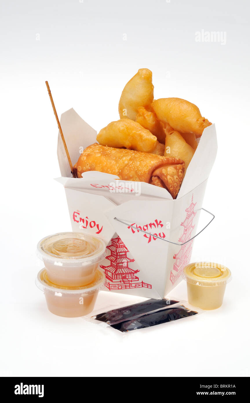 Open carton of take out chinese food with chicken fingers and eggroll on white background Stock Photo