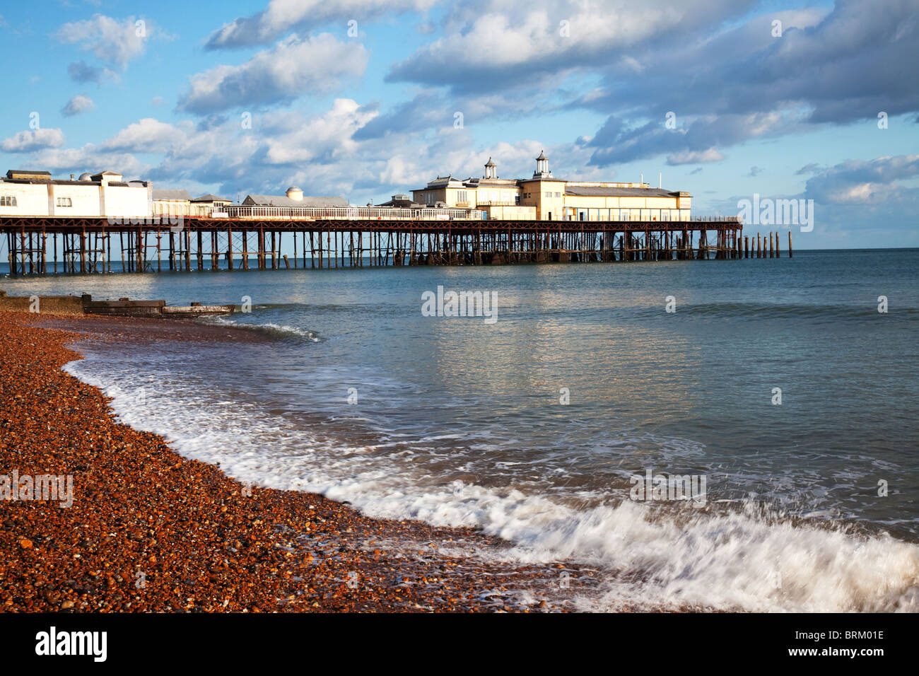A landscape view of the derelict Hastings Pier Stock Photo