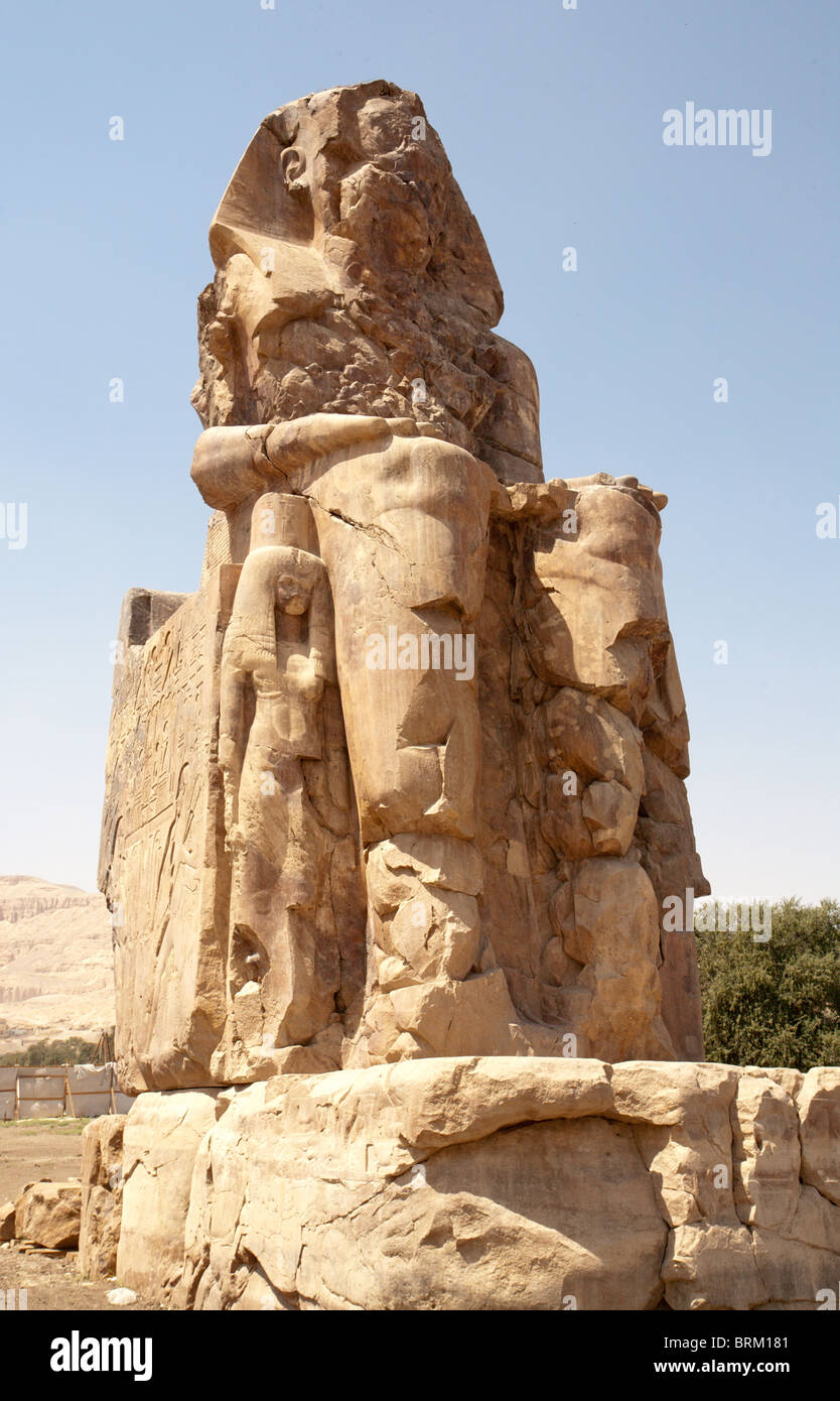 ancient Egyptian statue: one of colossi of memnon, Egypt, Luxor Stock Photo