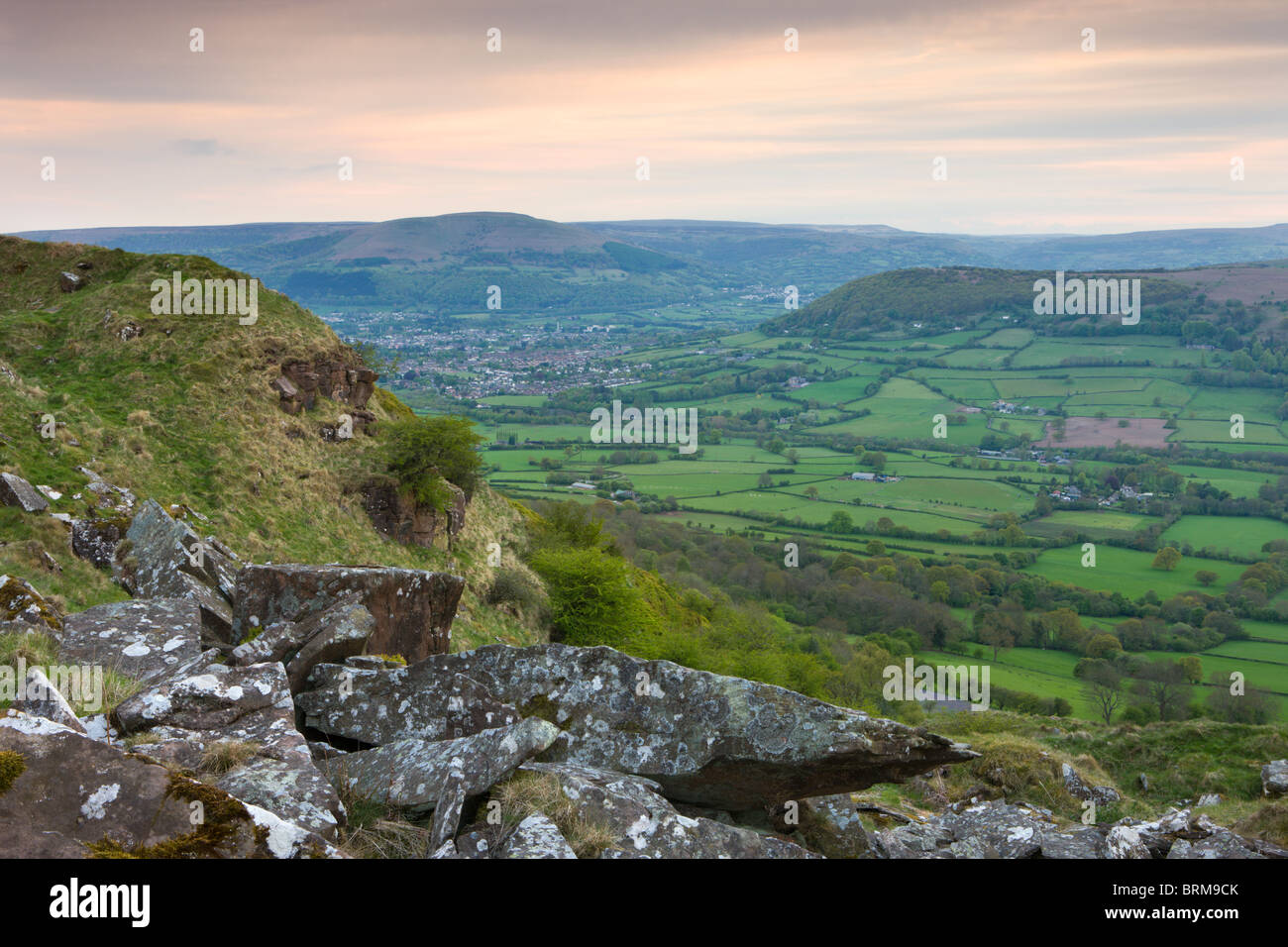 Rolling countryside looking towards Abergavenny from the summit of The Skirrid (Ysgyryd Fawr) mountain, Brecon Beacons Stock Photo