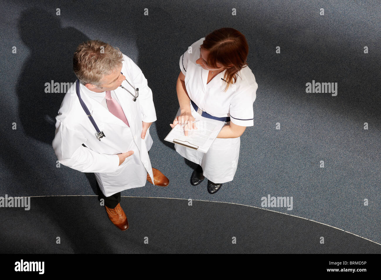 Mature nurse uniform hi-res stock photography and images - Alamy