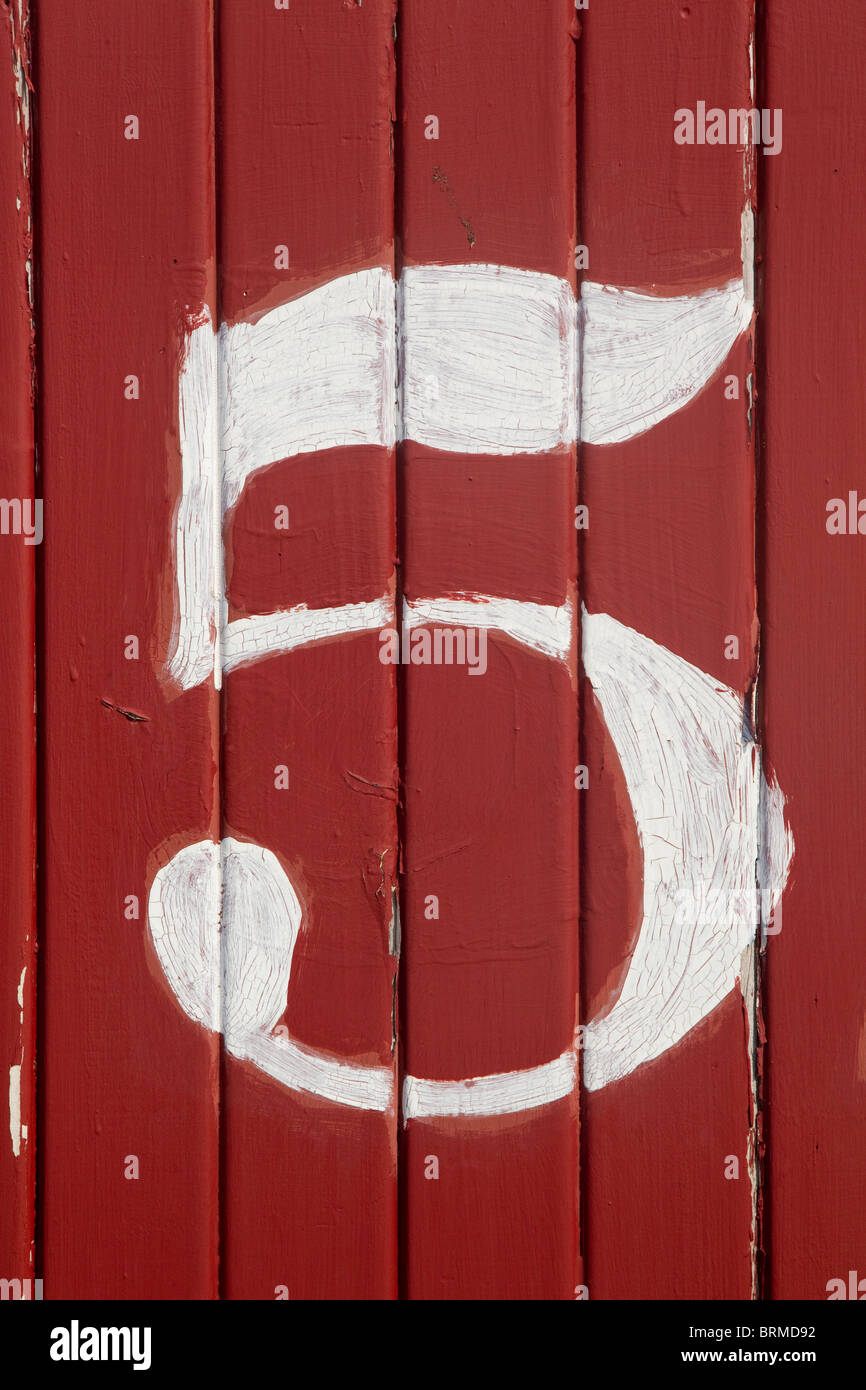 The number 5, white on red boards Stock Photo