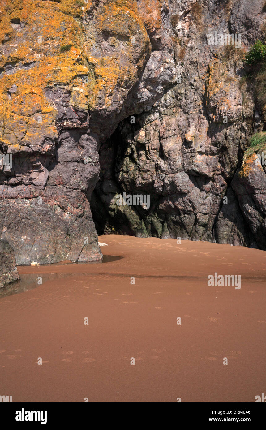 A cave cut into the rocks by the action of the sea at the north end of ...