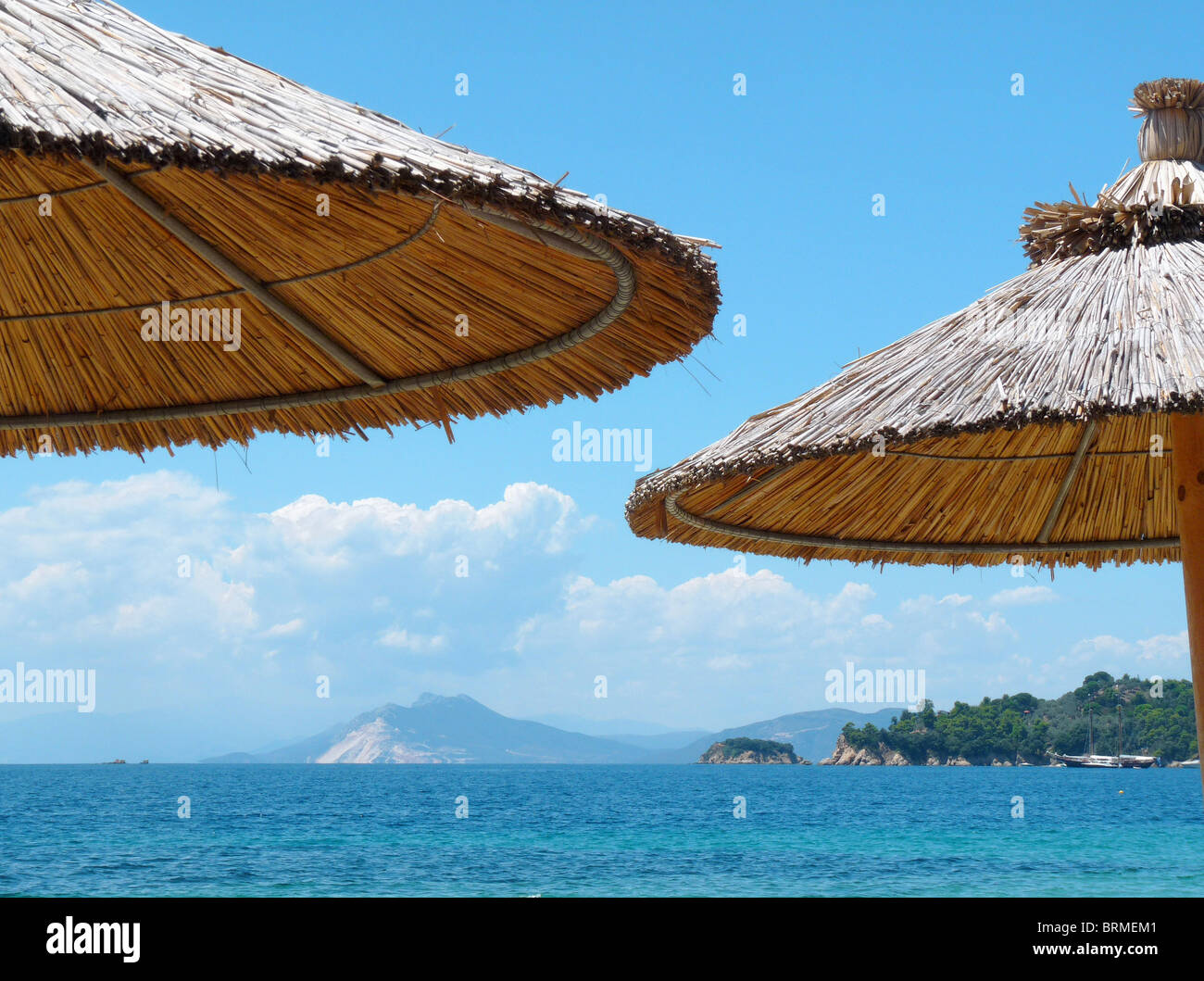 Beach umbrellas vromolimnos beach skiathos hi-res stock photography and  images - Alamy