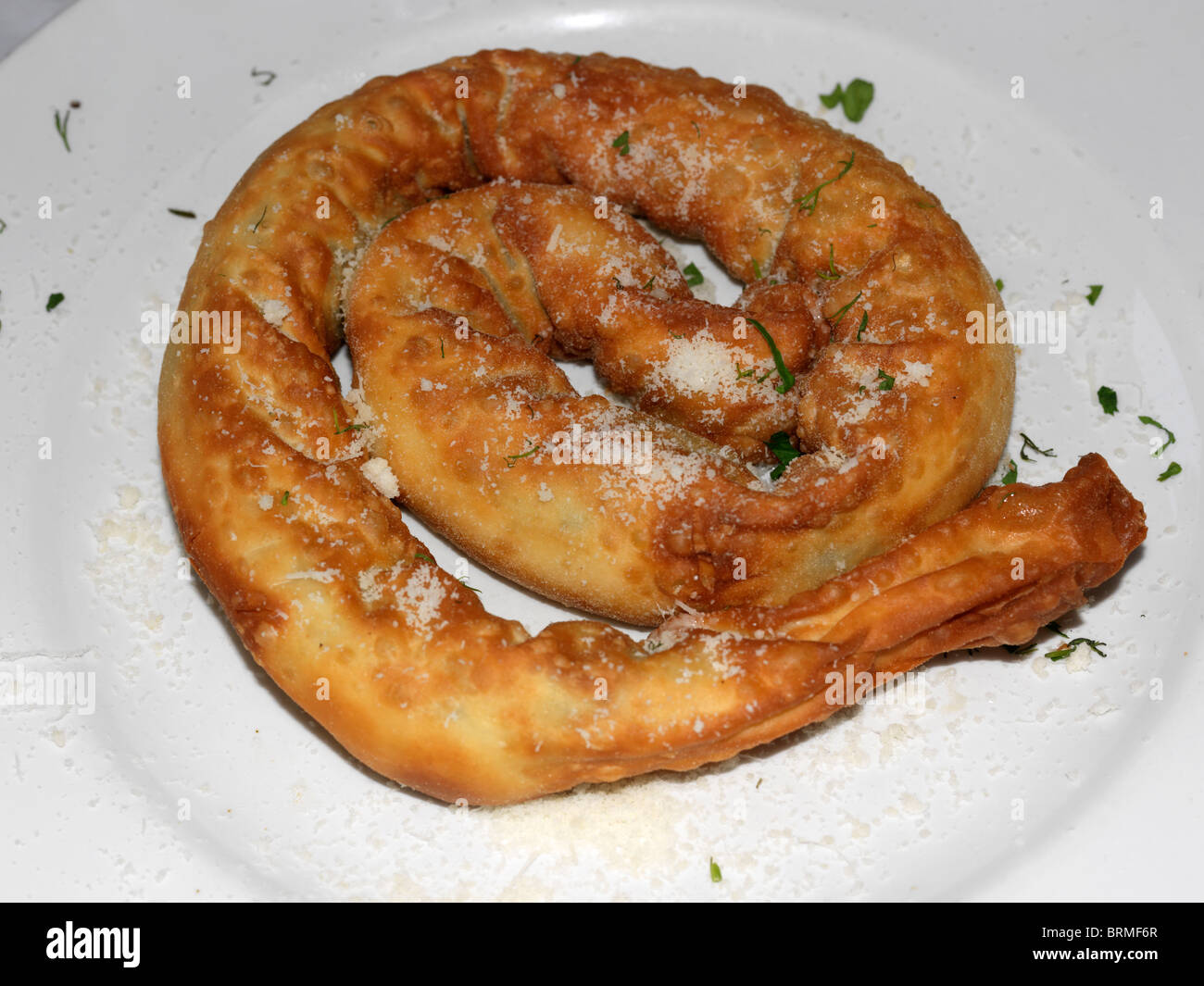Greece Battered Sausage On A Plate Stock Photo