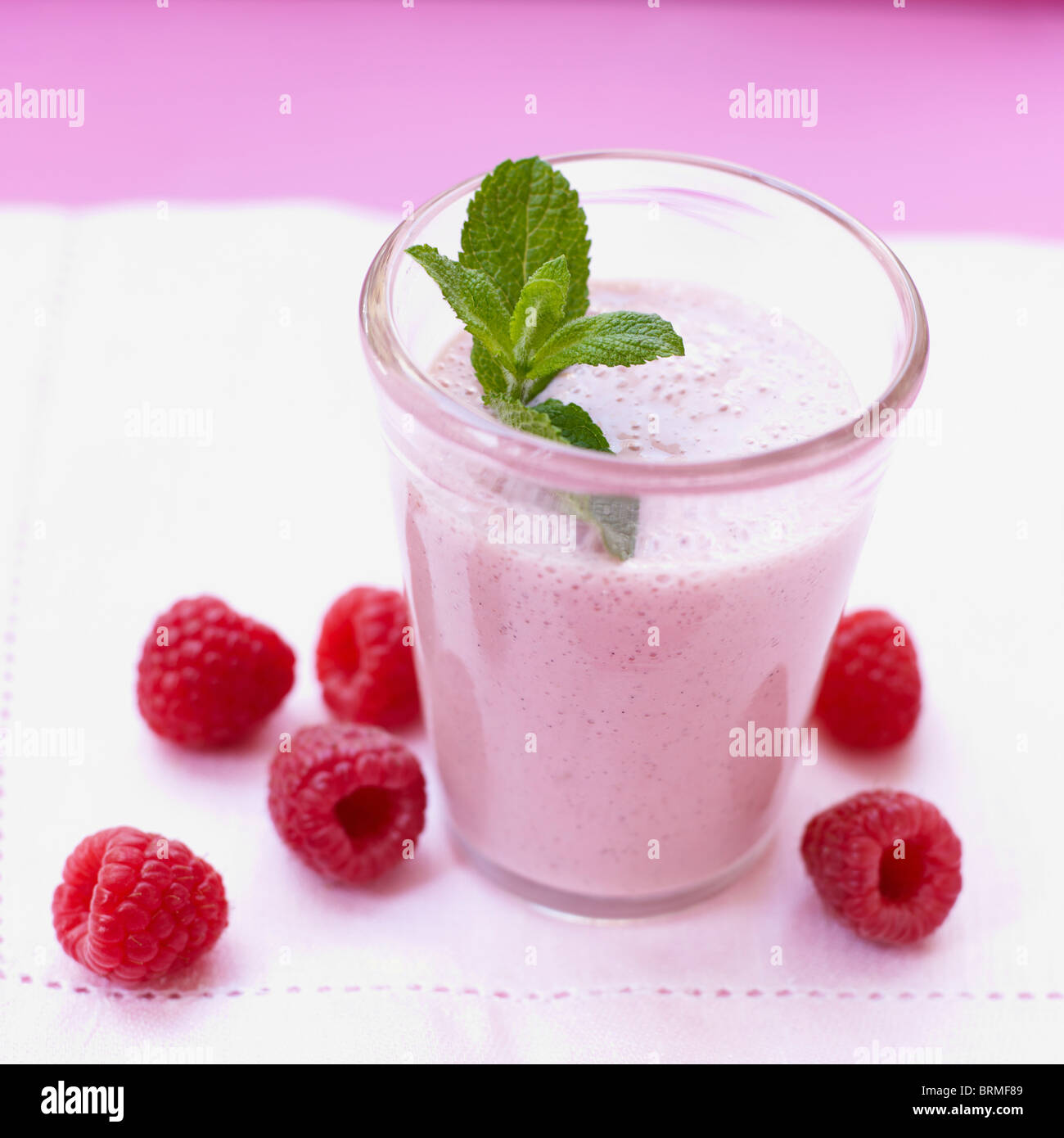 Raspberry shake with mint leaf Stock Photo Alamy