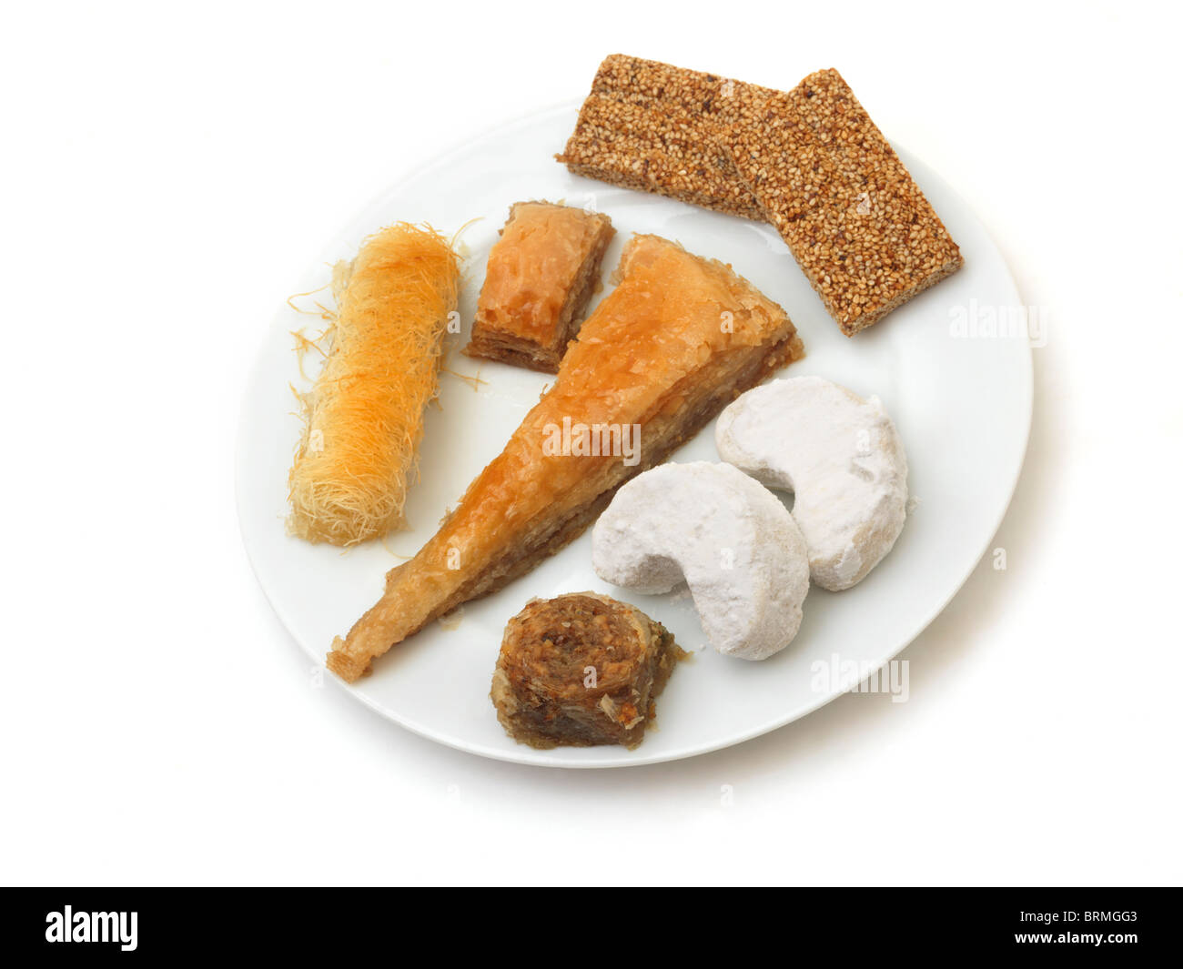 Greek Sweets Baclava, Kataifi, Kourabies Biscuits, Halva And Sesame Seed Cake Stock Photo