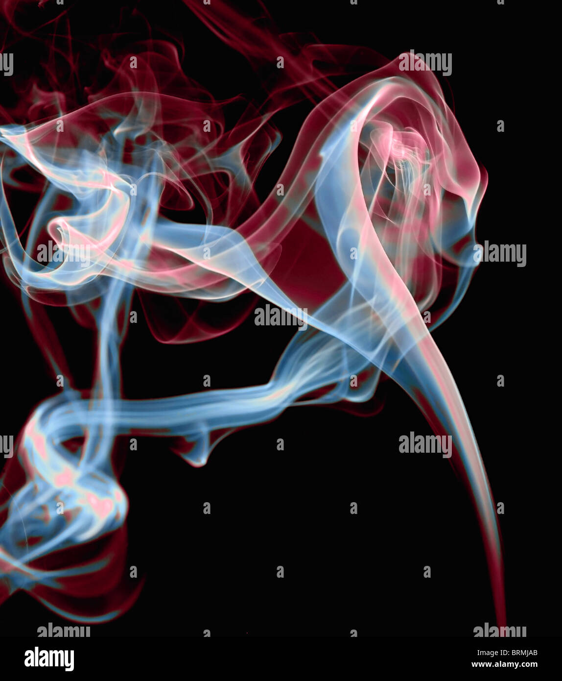 abstract rainbow colored smoke on a black background Stock Photo
